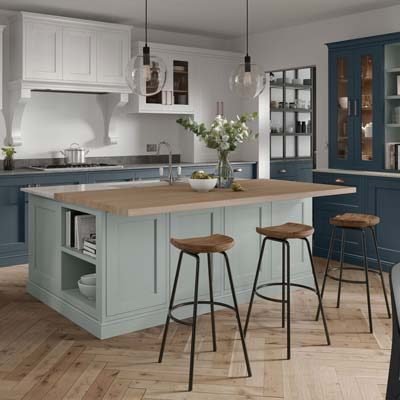 painted Solid timber shaker kitchen. quay blue base units and tall units with glass inserts, white wall units and light blue kitchen island with seating, open shelving and cupboards