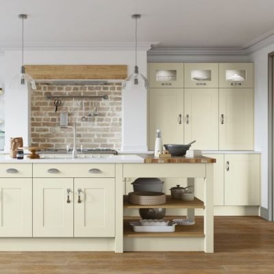 Athlone Plain shaker style kitchen in alabaster, cream colour. Tall wall units and base units with a kitchen island with cupboards and open shelving