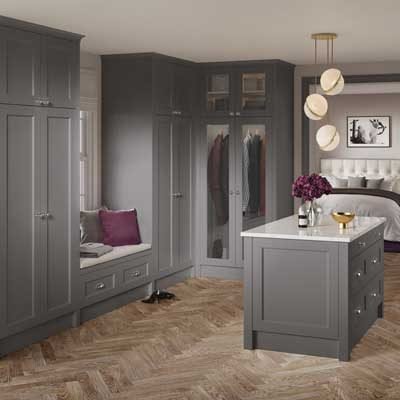 Dressing room setting. Bastille 5 piece shaker fitted wardrobes with dressing island and bench all in Dust Grey