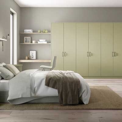 Belair Fitted Painted slab wardrobes and bedroom furniture in Sage green