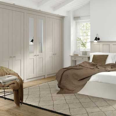 Conway fitted shaker wardrobes, matching bedside table and headboard in Cashmere