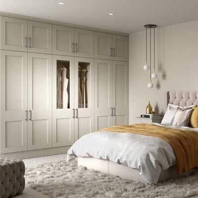 Melrose fitted shaker wardrobes, matching bedside tables and headboard in Pebble
