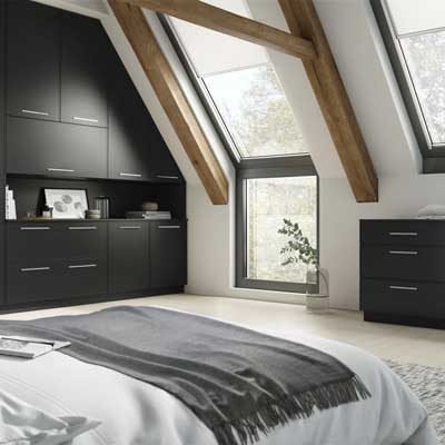 Vilo Mock in-frame angled fitted wardrobes with matching drawers in GRaphite